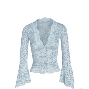 I am Gia lace top in baby blue.